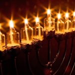 HOLY LIGHTS: LIGHTING HANUKKAH CANDLES IN SHUL